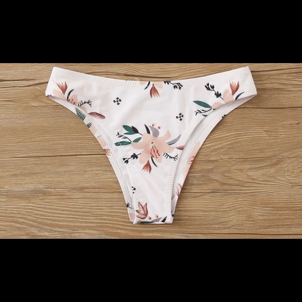 *Brand New* Never worn. Floral Bikini bottoms.